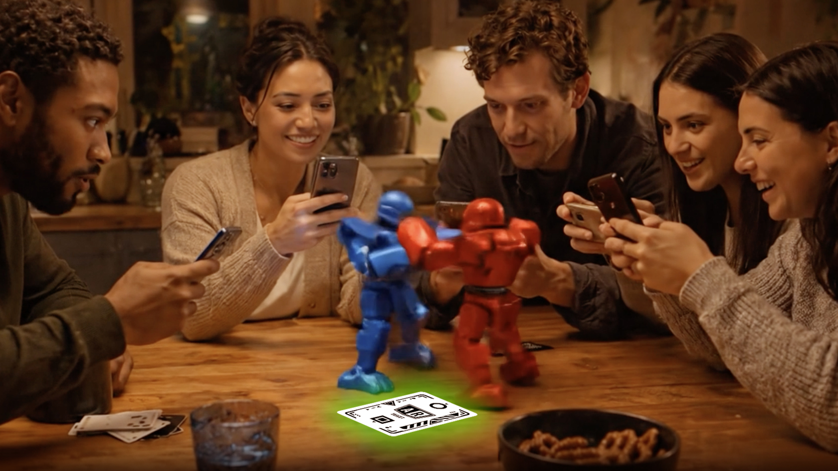 Dark Qards AR target card launching augmented reality party games on a table